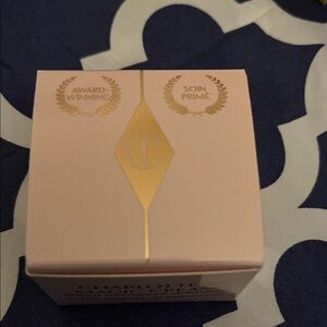 NWT Charlotte Tilbury Cream and Gold Box 0.5 fl oz $65 on there website